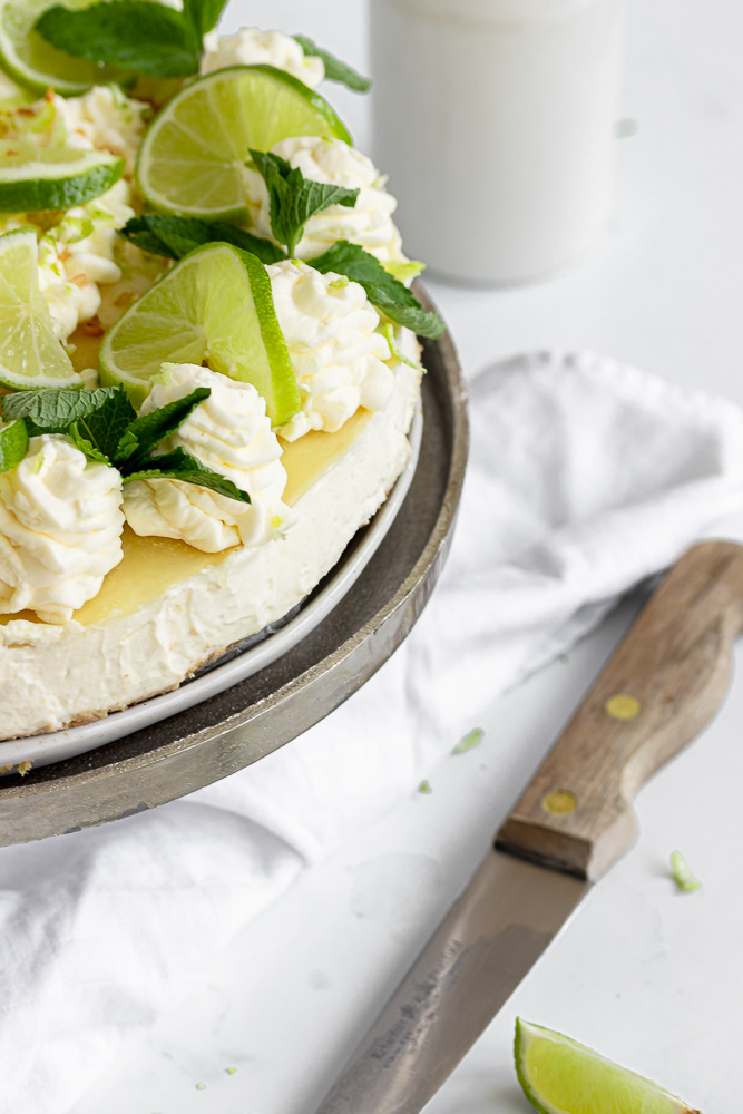 No-bake mojito cheesecake from the side with a white background