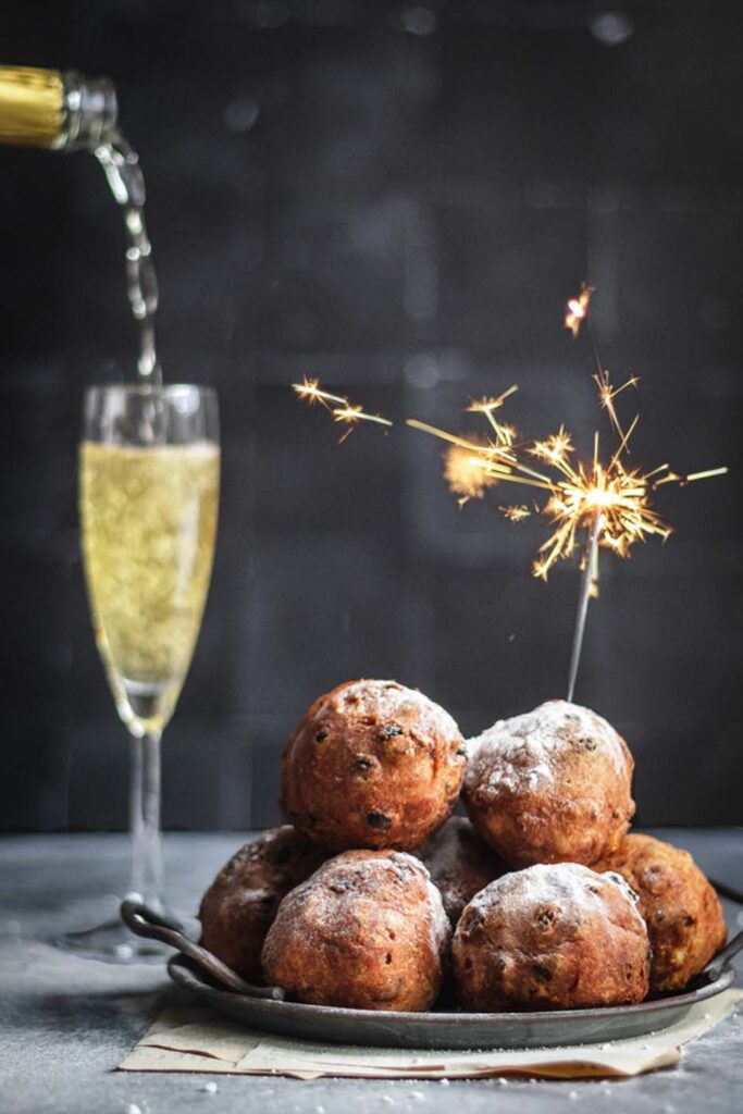 Oliebollen with champagne and sparkles
